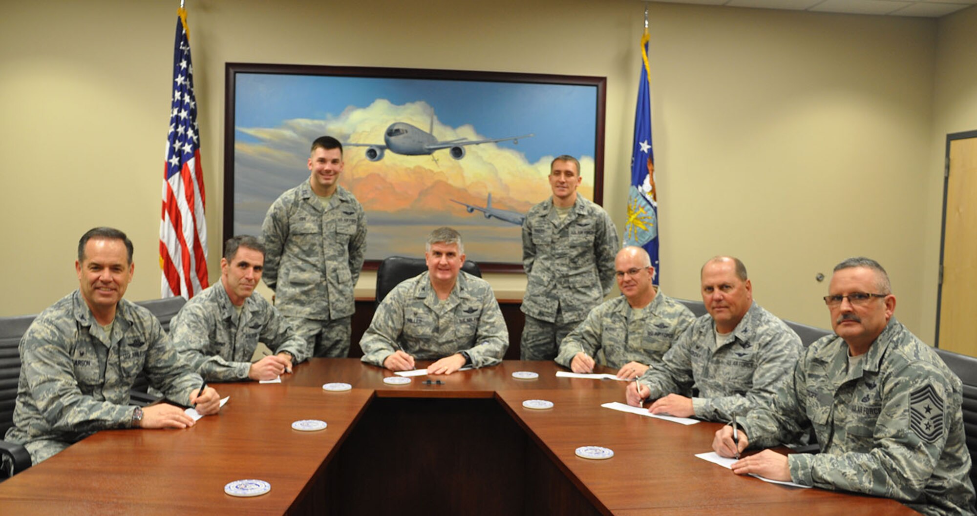 McConnell leadership poses for a photo after filling out their individual pledge forms for the Air Force Assistance Fund at McConnell Air Force Base, Kan., March 2, 2015.   This year's campaign began March 2 and will run until April 10.  The AFAF is an effort to raise money for charities that provide support to Air Force members and their families throughout the year. (U.S. Air Force photo by Tech. Sgt. Abigail Klein)

