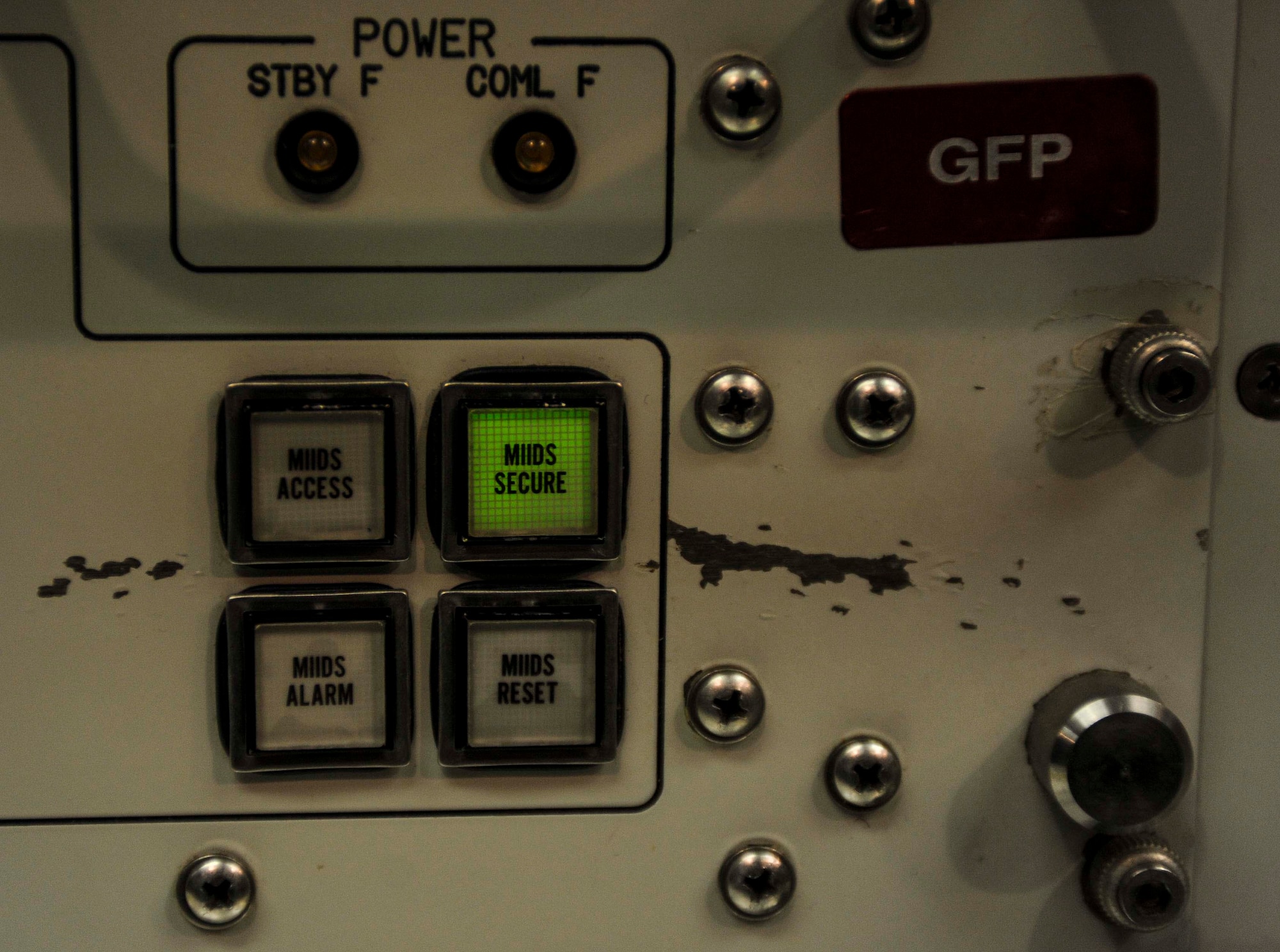 Buttons line the rapid execution and combat targeting console in the launch capsule of the Oscar 1 missile alert facility near Mohall, N.D., Jan. 9, 2015. Capsule crews control the missile from the REACT console through an array of coded commands, keys and switches. (U.S. Air Force photo/Senior Airman Stephanie Morris)