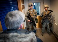 David Taylor, Times of London editor, speaks with security forces Airmen in Minot, N.D., Jan. 7, 2014. During his visit Taylor traveled out to a missile alert facility and interviewed Airmen working out at the site. (U.S. Air Force photo/Airman 1st Class Sahara L. Fales)