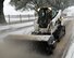 The 2nd Civil Engineer Squadron dirt boys keep the roads as clean and safe as possible during a winter storm on Barksdale Air Force Base, La., Feb. 25, 2015. The CES Airmen used a loader, kick brooms, two Bobcats and a sander to scrape ice off of base roads, bridges, and gates. (U.S. Air Force photo/Senior Airman Benjamin Raughton)