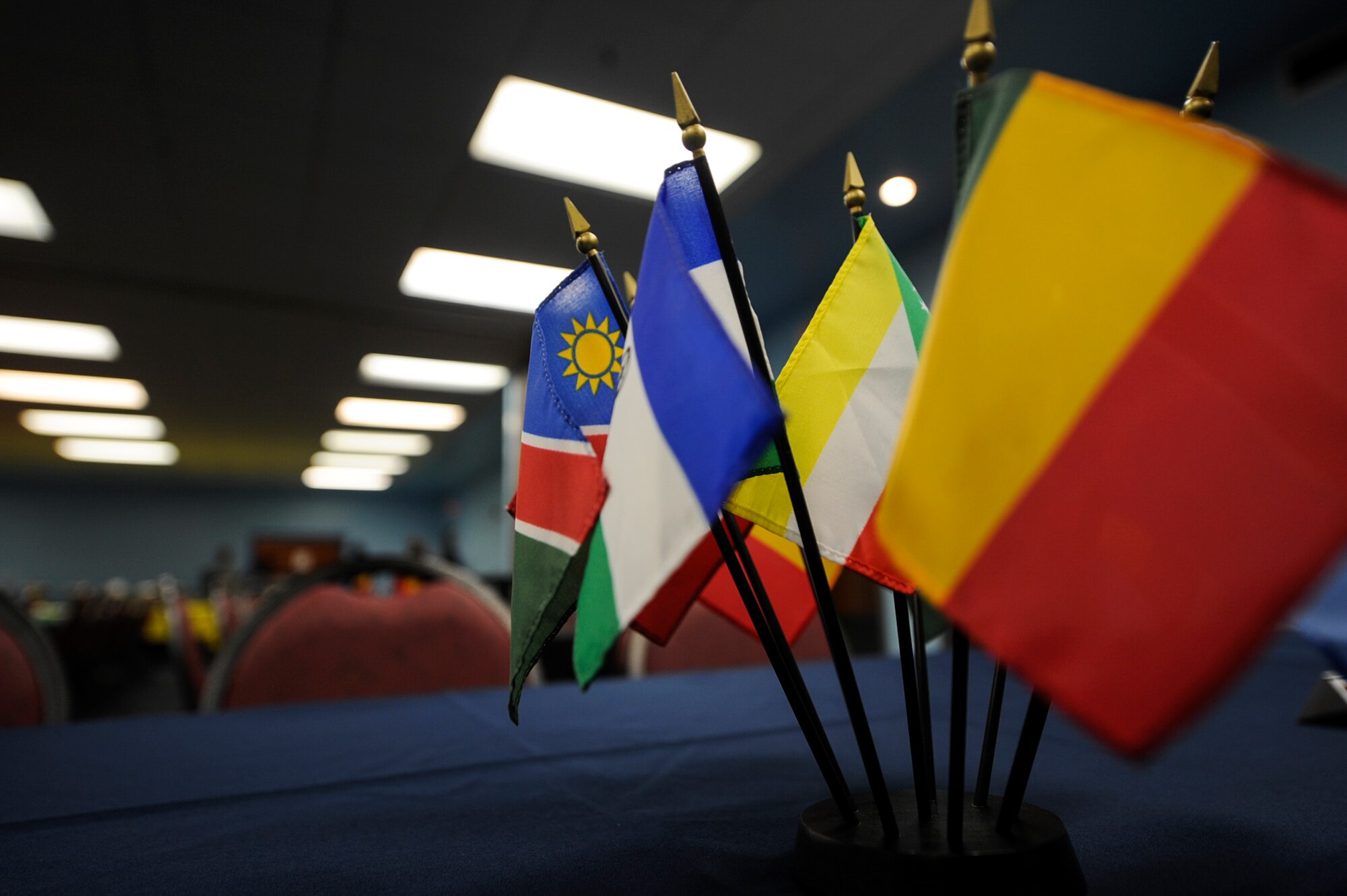 A centerpiece displaying flags from African countries rests on a table before the Black History Month luncheon Feb. 27, 2015, at Moody Air Force Base, Ga. Black History Month provides the opportunity for all to reflect on the roles African-American have played throughout history. (U.S. Air Force photo by Senior Airman Olivia Bumpers/Released)