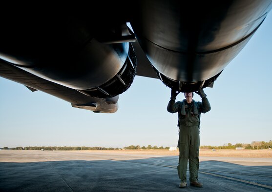Capt. Curtis Michael, 337th Test and Evaluation Squadron, inspects one of the B-1B Lancer’s four engines during preflight checks Feb. 20 at Eglin Air Force Base, Fla.  The 53rd Wing bomber from Dyess AFB, Texas was here for a few missions and to allow wing personnel an opportunity to see one of their geographically separated aircraft up close. (U.S. Air Force photo/Samuel King Jr.)