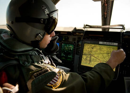 Maj. Dominic Ross, 337th Test and Evaluation Squadron, plots out the course for the B-1B Lancer flight prior to take off Feb. 20 at Eglin Air Force Base, Fla.   The 53rd Wing bomber from Dyess AFB, Texas was here for a few missions and to allow wing personnel an opportunity to see one of their geographically separated aircraft up close. (U.S. Air Force photo/Samuel King Jr.)