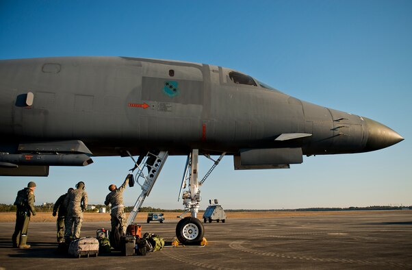 Maintainers and aircrew load up luggage onto a B-1B Lancer prior to the aircraft leaving Eglin Air Force Base, Fla. and returning to its home station Feb. 20.  The 53rd Wing bomber from Dyess AFB, Texas was here for a few missions and to allow wing personnel an opportunity to see one of their geographically separated aircraft up close. (U.S. Air Force photo/Samuel King Jr.)