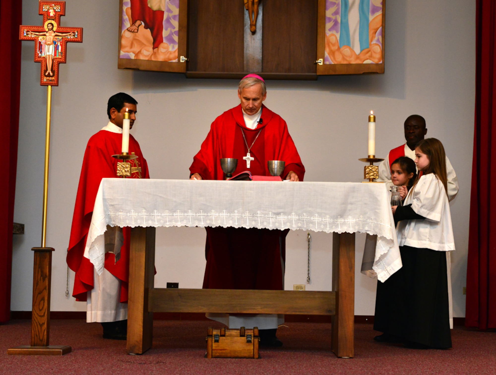 Rev. Richard Spencer, the auxiliary bishop of the Archdiocese for the military services, U.S., performs a confirmation Mass Feb. 24, 2015, at Incirlik Air Base, Turkey. The one-day base visit, which also included a chapel staff and family meet and greet and an office call with base leadership, concluded with a celebration reception for the confirmation candidates. (U.S. Air Force photo by Senior Airman Michael Battles/Released)