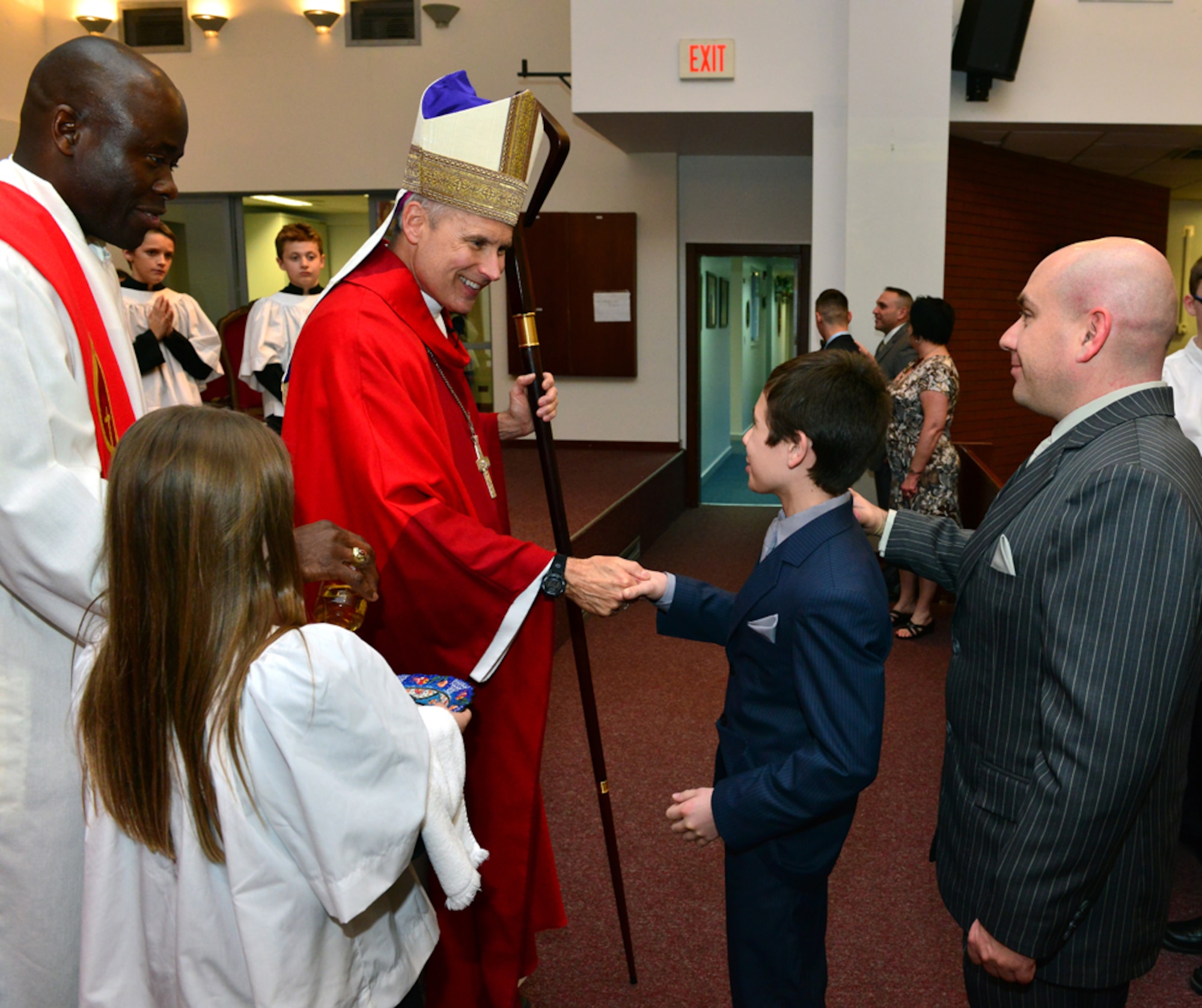 Rev. Richard Spencer, the auxiliary bishop of the Archdiocese for the military services, U.S., speaks with confirmation candidates Feb. 24, 2015, at Incirlik Air Base, Turkey. As part of the Catholic Mass ceremony Spencer confirmed eight Team Incirlik young adults. (U.S. Air Force photo by Senior Airman Michael Battles/Released)