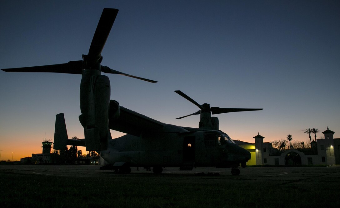Darkness falls over an MV-22B Osprey from Special-Purpose Marine Air-Ground Task Force Crisis Response-Africa prior to a combined U.S. and Spanish training exercise at an airfield near Morón Air Base, Spain, Feb. 24, 2015. U.S. Marines with SPMAGTF-CR-AF joined a Spanish aircrew from Bhelma IV to test the NATO allies’ ability to complete night operations.  (U.S. Marine Corps photo by Sgt. Paul Peterson/Released)