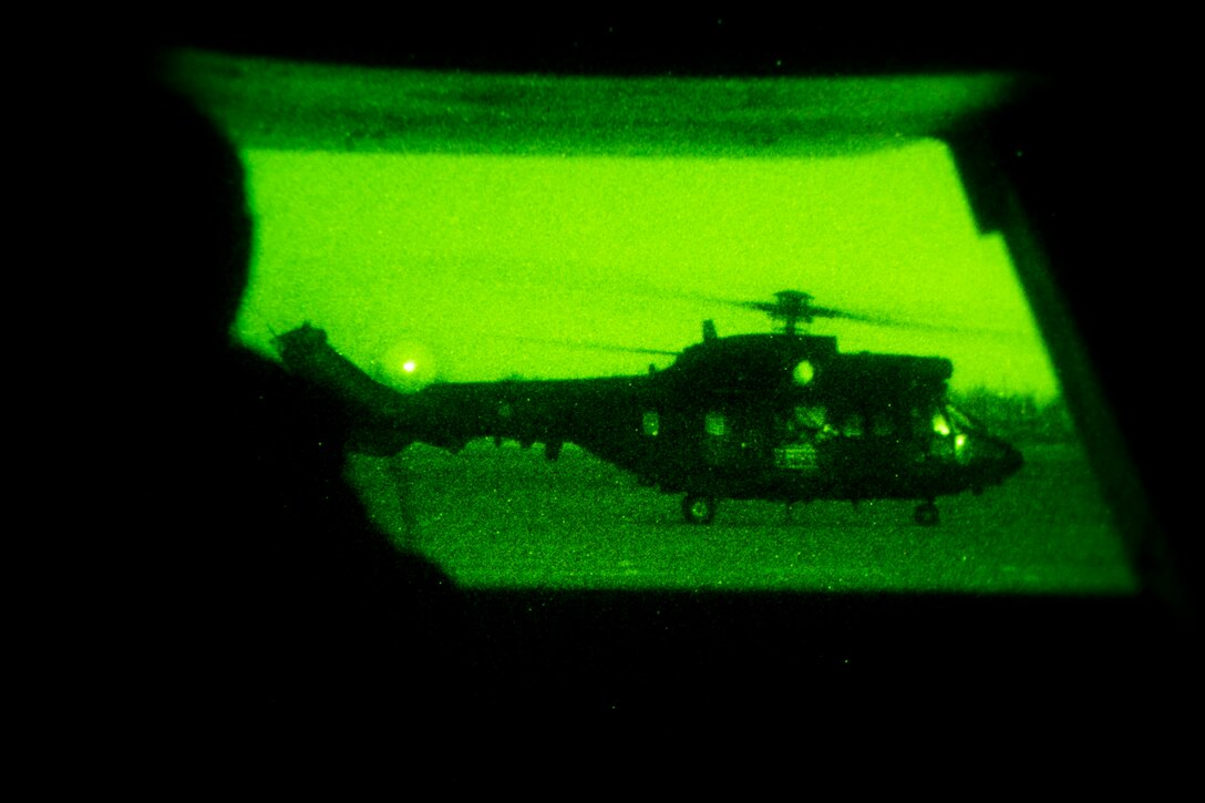 A Spanish helicopter from Bhelma IV prepares to take off from an airfield near Morón Air Base, Spain, Feb. 24, 2015. Spanish pilots flew with U.S. Marine Corps aviators from Special-Purpose Marine Air-Ground Task Force Crisis Response-Africa to hone the NATO team’s ability to complete combined night operations, which included numerous side-by-side landings. (U.S. Marine Corps photo by Sgt. Paul Peterson/Released)