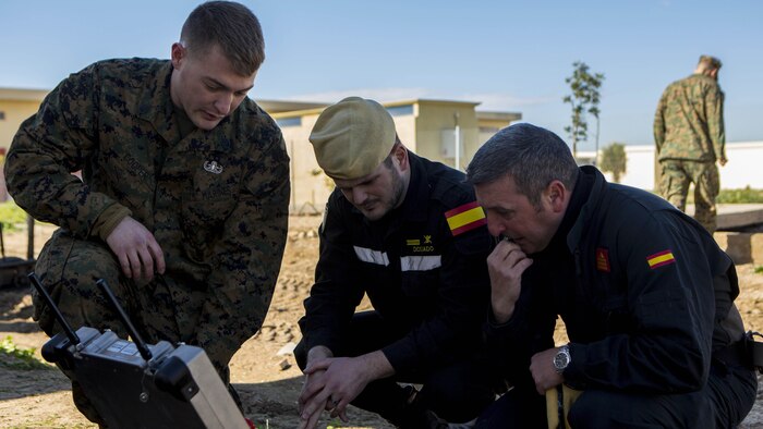 U.S. Marine Corps Staff Sgt. Andrew Cooper, an explosive ordnance disposal technician with Special-Purpose Marine Air-Ground Task Force Crisis Response-Africa, demonstrates the capabilities of a remote controlled robot used by EOD Marines to the Spanish Defense Force’s Unidad Militar de Emergencias, an emergency response force, at Morón Air Base, Spain, Feb. 18, 2015. The Marines used the demonstration as an opportunity to build a stronger relationship with UME personnel and set the stage for future joint training exercises.