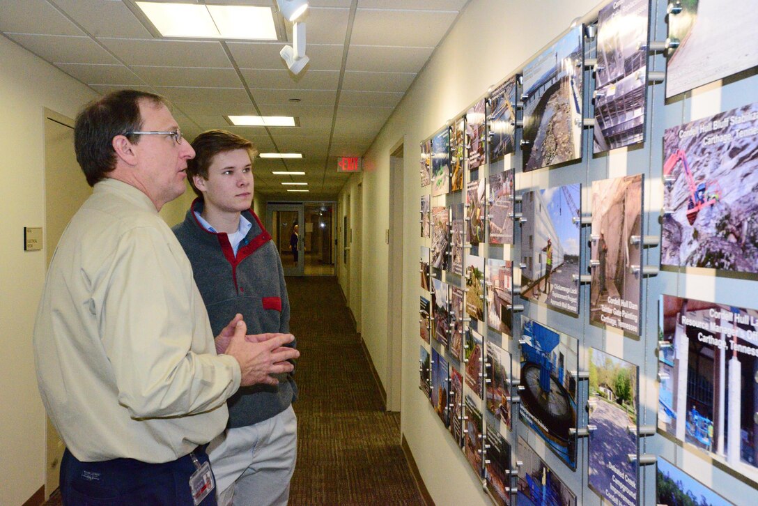 NASHVILLE, Tenn. (Feb 27, 2015) – Jimmy Waddle, chief of Engineering and Construction Branch, Nashville District (right) talks with Michael Lee a sophomore student from Montgomery Bell Academy.  Lee participated in an engineer shadow program with the U. S. Army Corps of Engineers Nashville District engineers to learn more about the jobs and educational requirements of the career field. 