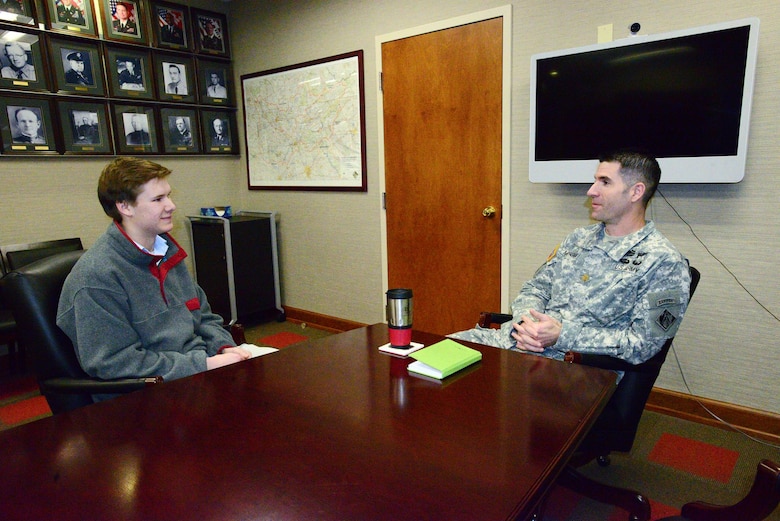 NASHVILLE, Tenn. (Feb 27, 2015) – Maj. Brad Morgan, deputy district engineer, Nashville District (right) explains the many componets about the Nashville District to Michael Lee a sophomore student from Montgomery Bell Academy during an engineer shadow day with the U. S. Army Corps of Engineers Nashville District.   