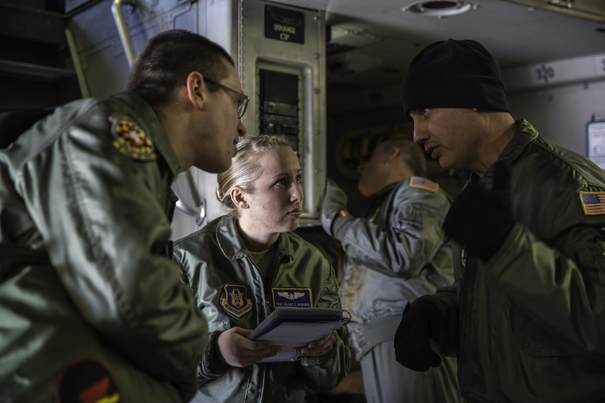 Tech. Sgt. Arrin Baker discusses load plan and patient configuration with Tech. Sgt. Hilary Rentner and Tech. Sgt. James Laska Feb. 21, 2015 during a training mission in San Juan, Puerto Rico. The training mission was part of a three day fly-away with Airmen from the 315th Airlift Wing at Joint Base Charleston, South Carolina and aeromedical Airmen from the 459th Air Refueling Wing at Joint Base Andrews, Maryland. The training mission was a cost-effective means to accomplish currency items and evaluations for flight crew members and provided C-17 familiarization and proficiency training for aeromedical Airmen. Baker is a load master with the 300th Airlift Squadron. Rentner and Laska are aeromedical technicians with the 459th Aeromedical Evacuation Squadron. (U.S. Air Force Photo/Tech. Sgt. Shane Ellis)
