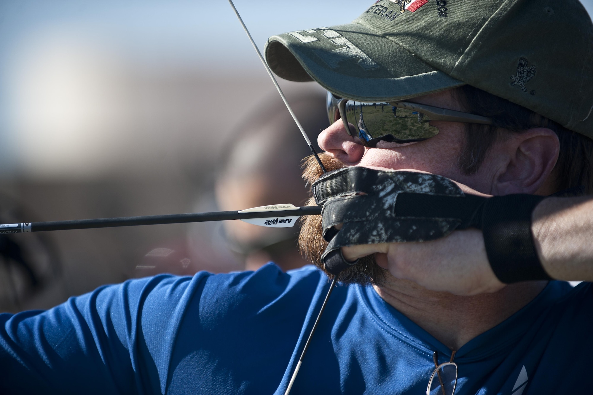 Retired U.S. Air Force Chief Master Sgt. Robert Zukauskas aims at a target during an archery practice session Feb. 27, 2015, at Nellis Air Force Base, Nev. Zukauskas suffered multiple injuries from a rocket attack during a deployment to Iraq in 2009. (U.S. Air Force photo/Staff Sgt. Siuta B. Ika)