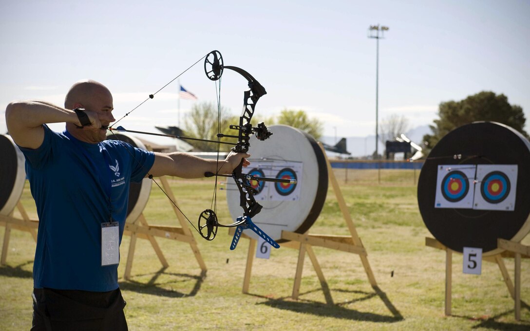 Edward Newbern aims at a target during an archery practice session Feb 26, 2015, on Nellis Air Force Base, Nev. Archery is one of 13 adaptive sports that athletes will be competing in throughout the trials. (U.S. Air Force photo/Airman 1st Class Rachel Loftis)