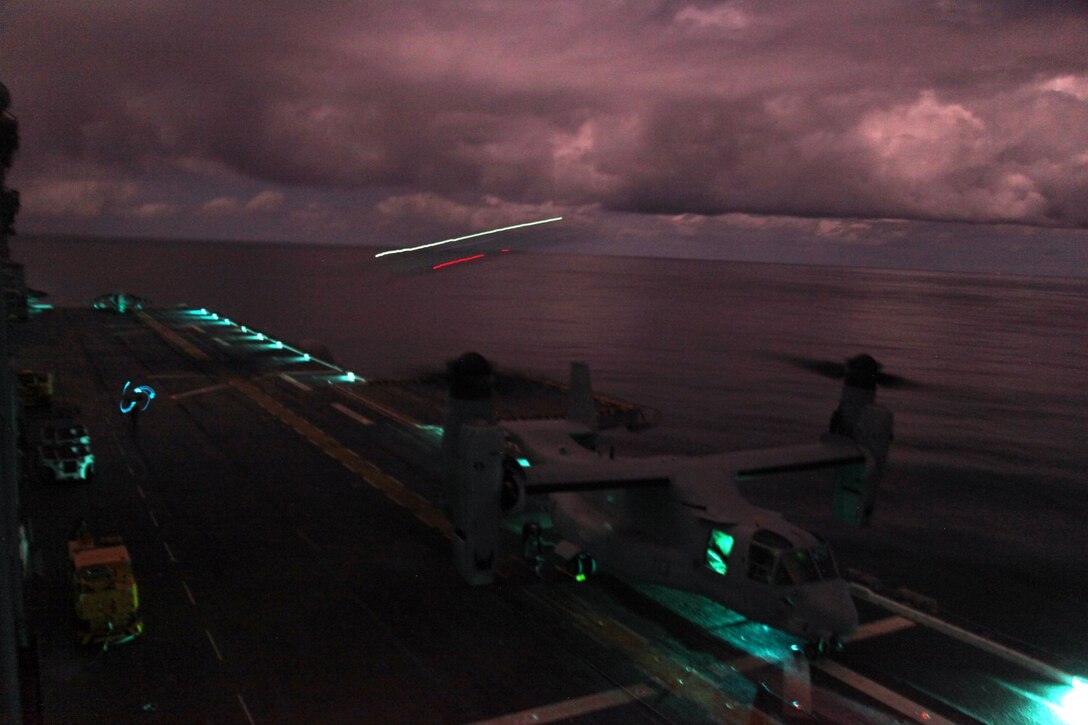 An MV-22B Osprey with Medium Tiltrotor Squadron 161 (Reinforced), 15th Marine Expeditionary Unit, lands on the USS Essex (LHD 2) during Amphibious Squadron/Marine Expeditionary Unit Integration Training (PMINT) off the coast of San Diego March 1, 2015. The 15th MEU’s air combat element continues to work with their Navy counterparts to prepare for their upcoming deployment. (U.S. Marine Corps photo by Cpl. Steve H. Lopez/Released)