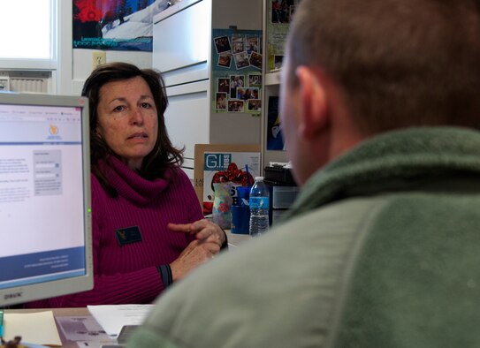 Mary Martin, Laramie County Community College program assistant, provides education guidance with an Airman Feb. 25, 2015, in the 90th Force Support Squadron Education and Training Center on F.E. Warren Air Force Base, Wyo. Representatives from Laramie County Community College, Park University and Embry-Riddle Aeronautical University are located in the center and provide face-to-face interaction for those seeking educational assistance. (U.S. Air Force photo by Airman 1st Class Malcolm Mayfield)