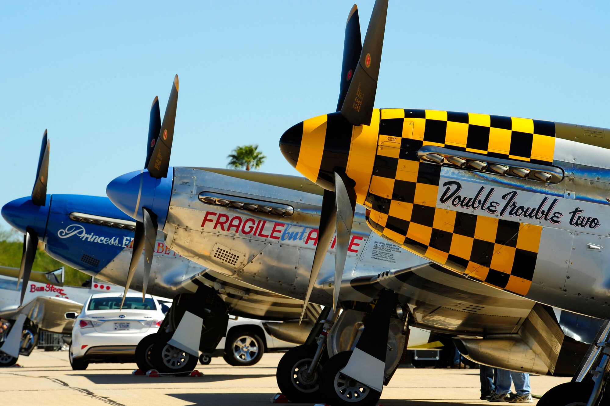 Historic aircraft are parked on the flightline during the 2015 Heritage Flight Training and Certification Course at Davis-Monthan Air Force Base, Ariz., March 1, 2015. Established in 1997, the HFTCC featured aerial demonstrations from historical and modern fighter aircraft which will fly in formation together during air shows across the country. (U.S. Air Force photo by Tech. Sgt. Courtney Richardson/Released)