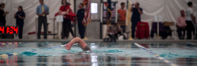 Lt. Shannon Scaff awaits the go signal before a 24-hour swim Feb. 27, 2015 at the Martin Luther King Jr. Pool in Charleston, S.C. He swam to honor a fallen pilot and raise money for a non-profit organization. Scaff swam nearly 28 miles in honor of his friend, Coast Guard Lt. Commander Dale Taylor, who lost his life in a helicopter crash with three other Coast Guardsmen Feb. 28, 2012. Scaff is a U.S. Coast Guard’s Maritime Law Enforcement Academy Public Affairs officer and a former helicopter rescue swimmer stationed in Charleston. (U.S. Air Force photo/Senior Airman Jared Trimarchi) 