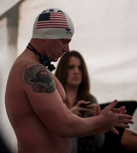 Lt. Shannon Scaff mentally prepares before attempting to swim for 24 hours on Feb. 27, 2015 at the Martin Luther King Jr. Pool in Charleston, S.C. He swam to honor a fallen pilot and raise money for a non-profit organization. Scaff swam nearly 28 miles in honor of his friend, Coast Guard Lt. Commander Dale Taylor, who lost his life in a helicopter crash with three other Coast Guardsmen Feb. 28, 2012. Scaff is a U.S. Coast Guard’s Maritime Law Enforcement Academy Public Affairs officer and a former helicopter rescue swimmer stationed in Charleston. (U.S. Air Force photo/Senior Airman Jared Trimarchi) 