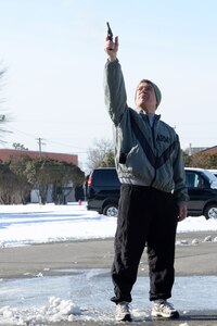 U.S. Army Col. William Galbraith, 733rd Mission Support Group commander, fires the gun to start the 17th Annual Fort Eustis 10K Run at Fort Eustis, Va., Feb. 28, 2015. The race took runners past the historic Matthew Jones House, along the James River and past an early American brick factory located on Mulberry Island. (U.S. Air Force photo by Staff Sgt. Teresa J. Cleveland/Released)