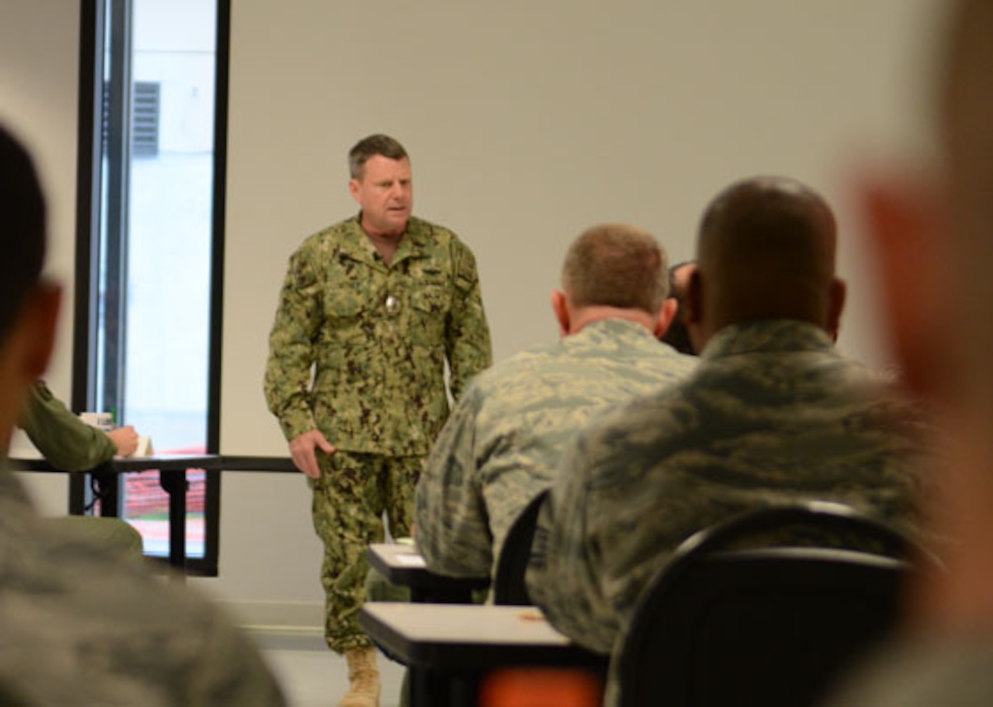 Admiral Bill Gortney, Commander of NORAD U.S. Northern Command, talks with Florida Air National Guard members at the 125th Fighter Wing, Feb. 28, 2015. Photo by Master Sgt. Jaclyn Lyons
