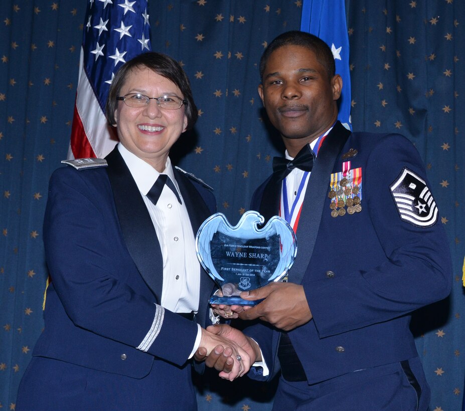 Master Sgt. Wayne Sharp, 377th Medical Group, was named AFNWC First Sergeant of the Year at an awards ceremony Feb. 27 at the Mountain View Club. Gen. Sandra Finan, Air Force Nuclear Weapons Center commander, presented the award. (Photo by Todd Berenger)