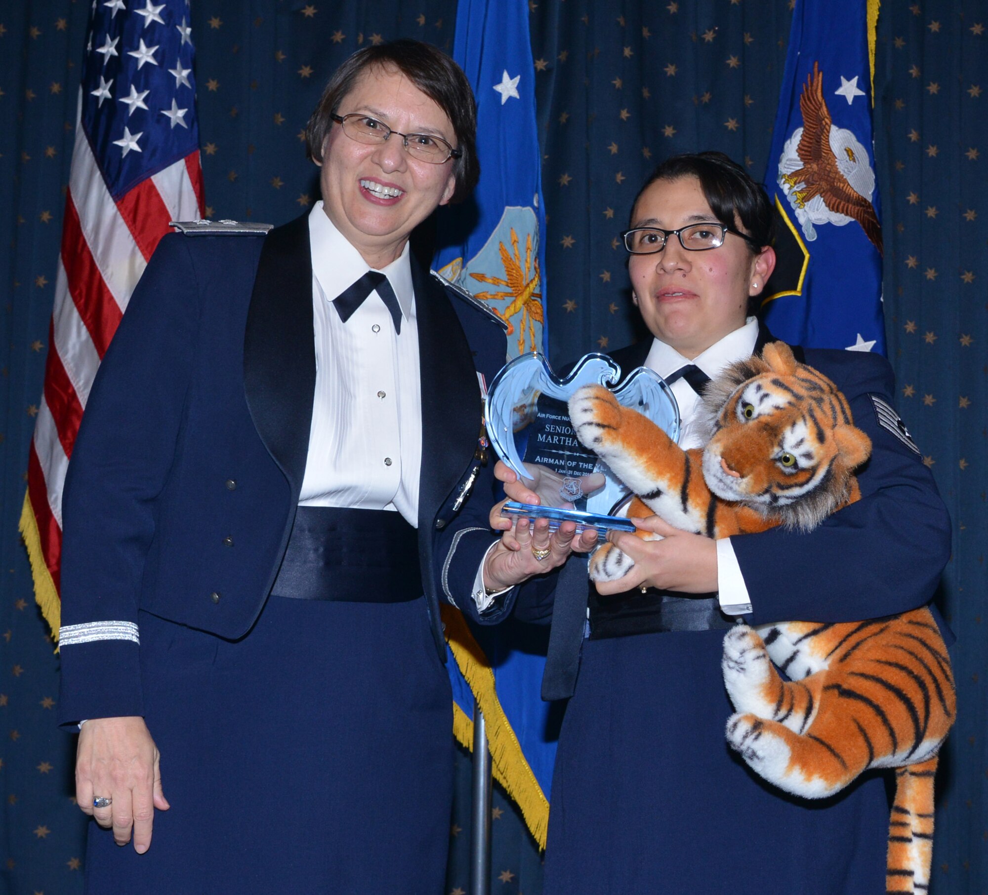 Airman 1st Class Martha Dirton, 377th Medical Group, was named AFNWC Airman of the Year at an awards ceremony Feb. 27 at the Mountain View Club. Gen. Sandra Finan, Air Force Nuclear Weapons Center commander, presented the award. (Photo by Todd Berenger)