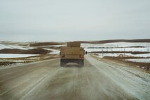 Airmen from the 91st Missile Security Forces “trip-out” to a missile alert facility in North Dakota, Feb. 12, 2015. Security forces have several layers of cold weather gear for warmth. The Humvees they travel in are heated, and they’re able to switch out if necessary so that individuals don’t have to stay in the cold for dangerously long periods of time. (U.S. Air Force photo/Senior Airman Brittany Y. Bateman)