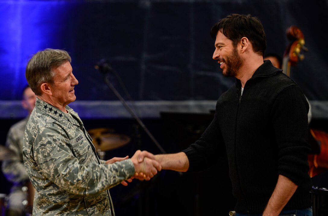 U.S. Air Force Gen. Herbert J. "Hawk" Carlisle, Air Combat Command commander, greets Harry Connick Jr., musician, actor and “American Idol” judge, during a good-will tour at Langley Air Force Base, Va., Feb. 23, 2015. During the visit, Connick Jr. listened to a performance by the U.S. Heritage of America Band “Rhythm in Blue” jazz ensemble, performed with his band and then answered questions from U.S. Army, Navy and Air Force Service member-musicians. (U.S. Air Force photo by Senior Airman Kayla Newman/Released)