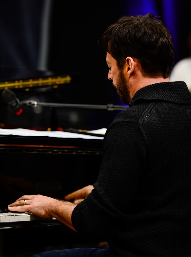 Harry Connick Jr., musician, actor and “American Idol” judge, and his band perform for U.S. Air Force, Army and Navy Service member-musicians during a visit to Langley Air Force Base, Va., Feb. 23, 2015. During the visit Connick Jr. listened and gave constructive critiques to the U.S. Air Force Heritage of America “Rhythm in Blue” jazz ensemble members and answered questions from the audience. (U.S. Air Force photo by Senior Airman Kayla Newman/Released)