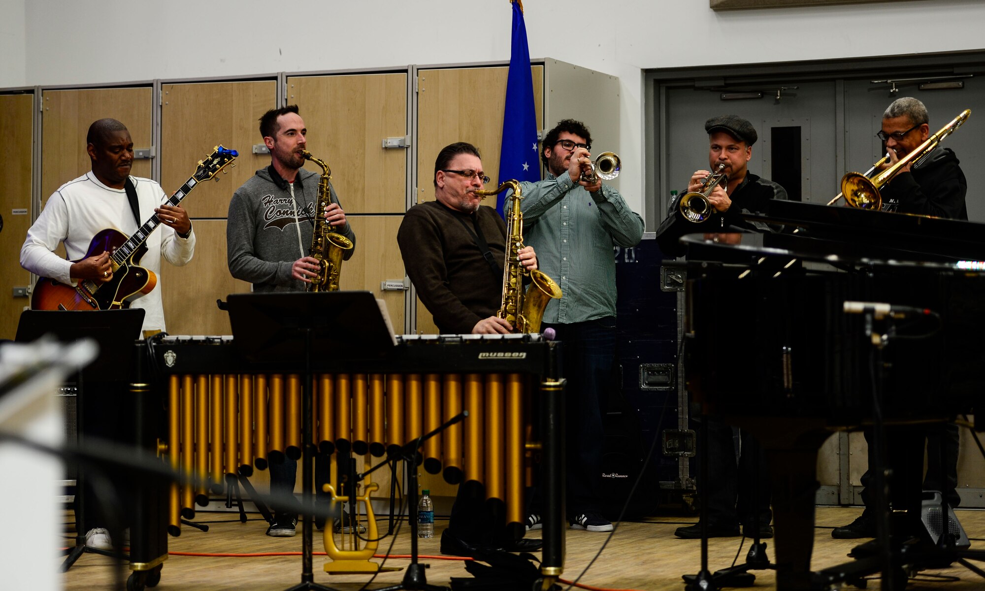 Members of the “Harry Connick Jr. Big Band” perform for U.S. Air Force, Army and Navy Service member-musicians during a visit to Langley Air Force Base, Va., Feb. 23, 2015. The U.S. Air Force Heritage of America Band “Rhythm in Blue” ensemble hosted Connick Jr. and his band as part of a good-will tour of the base. (U.S. Air Force photo by Senior Airman Kayla Newman/Released)