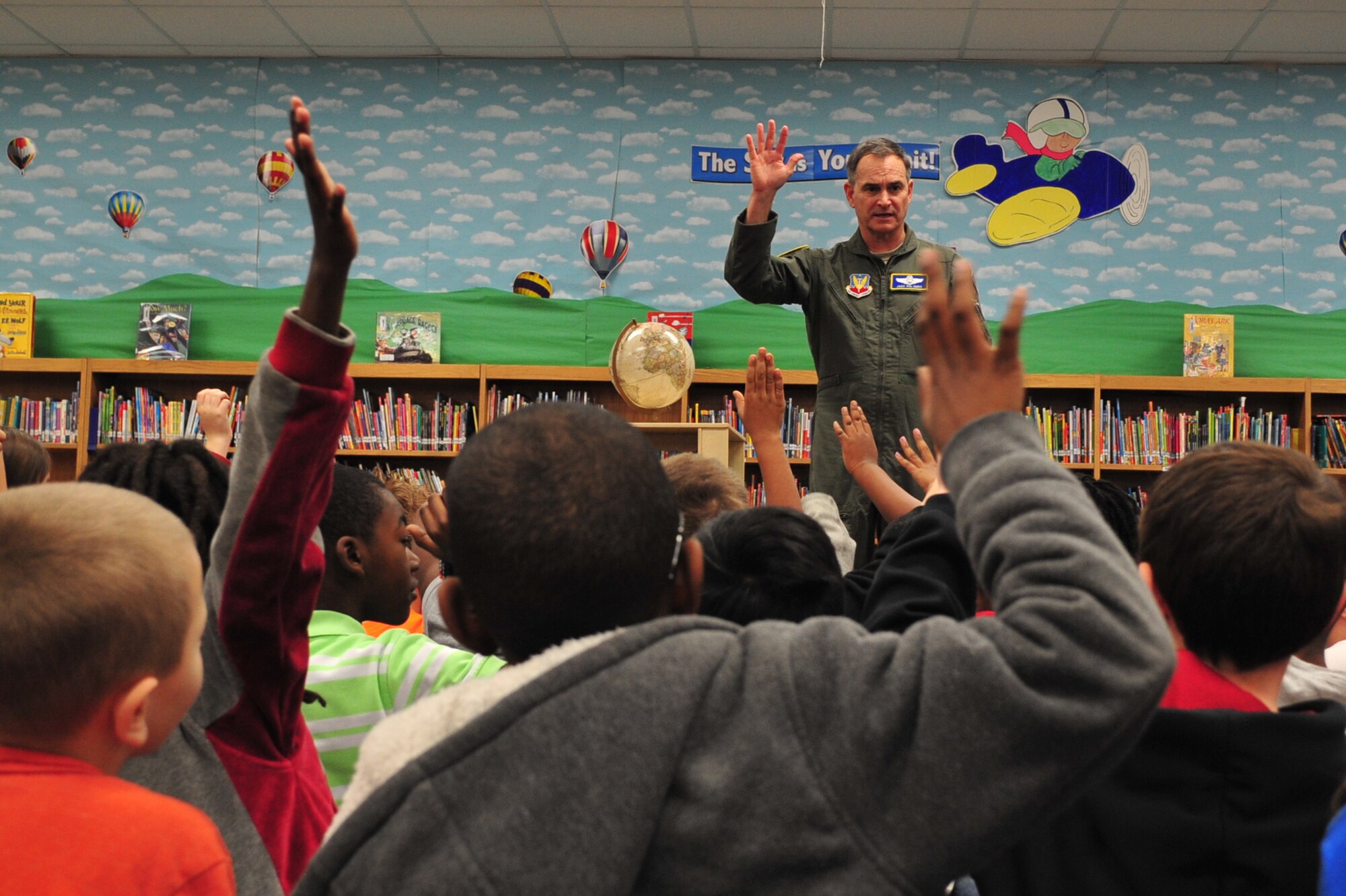 U.S. Air Force Maj. Gen. H.D. Polumbo Jr., Ninth Air Force commander, speaks to a group of second-grade students at Shaw Heights Elementary School, Shaw Air Force Base, S.C., March 2, 2015. Polumbo visited the school on Read Across America Day to encourage children to read and to raise awareness of the importance of a good education. (U.S. Air Force photo by Tech. Sgt. Ave I. Young/Released)
