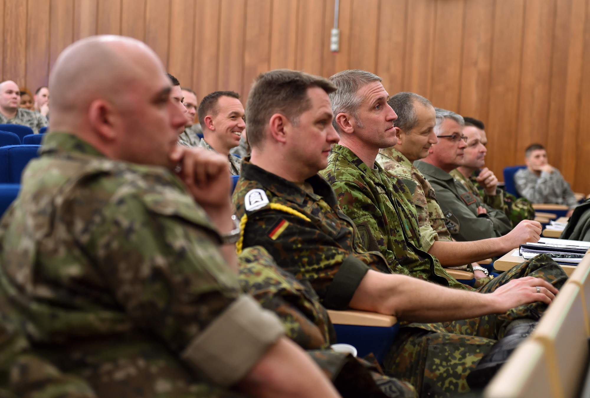 A group of enlisted leaders from six different nations’ air forces throughout Europe attend the Kaiserslautern Military Community First Sergeant Council's First Sergeant Symposium at Einsiedlerhof, Germany, Feb. 26, 2015. The group of enlisted leaders including the chief master sergeant of the Romanian, Slovak and Estonian air forces and other leaders from the German, Italian, Slovenian and the United Kingdom’s air forces visited Ramstein before attending the First Sergeant Symposium. More than 120 students attended the annual symposium. (U.S. Air Force photo/Staff Sgt. Sara Keller)