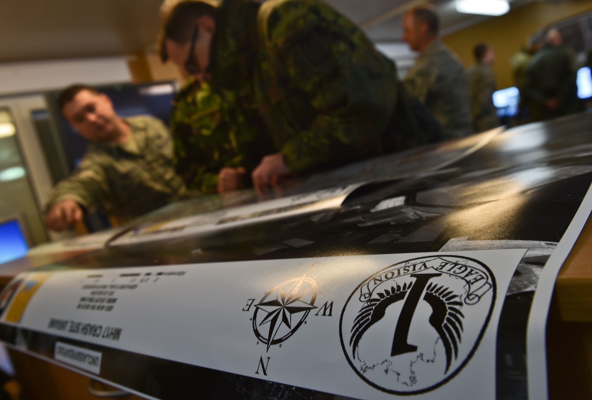 Staff Sgt. Sean Steigerwalt, 24th Intelligence Squadron data acquisition segment NCOIC, shows CMSgt Guenter Ebert, German air force, the capabilities of the Eagle Vision One program at Ramstein Air Base, Germany, Feb. 23, 2015. A group of enlisted leaders including the chief master sergeant of the Romanian and Estonian air forces and other leaders from the German, Italian, Slovenian and the United Kingdom’s air forces forces visited Ramstein before attending the Kaiserslautern Military Community First Sergeant Council's First Sergeant Symposium. (U.S. Air Force photo/Staff Sgt. Sara Keller) 