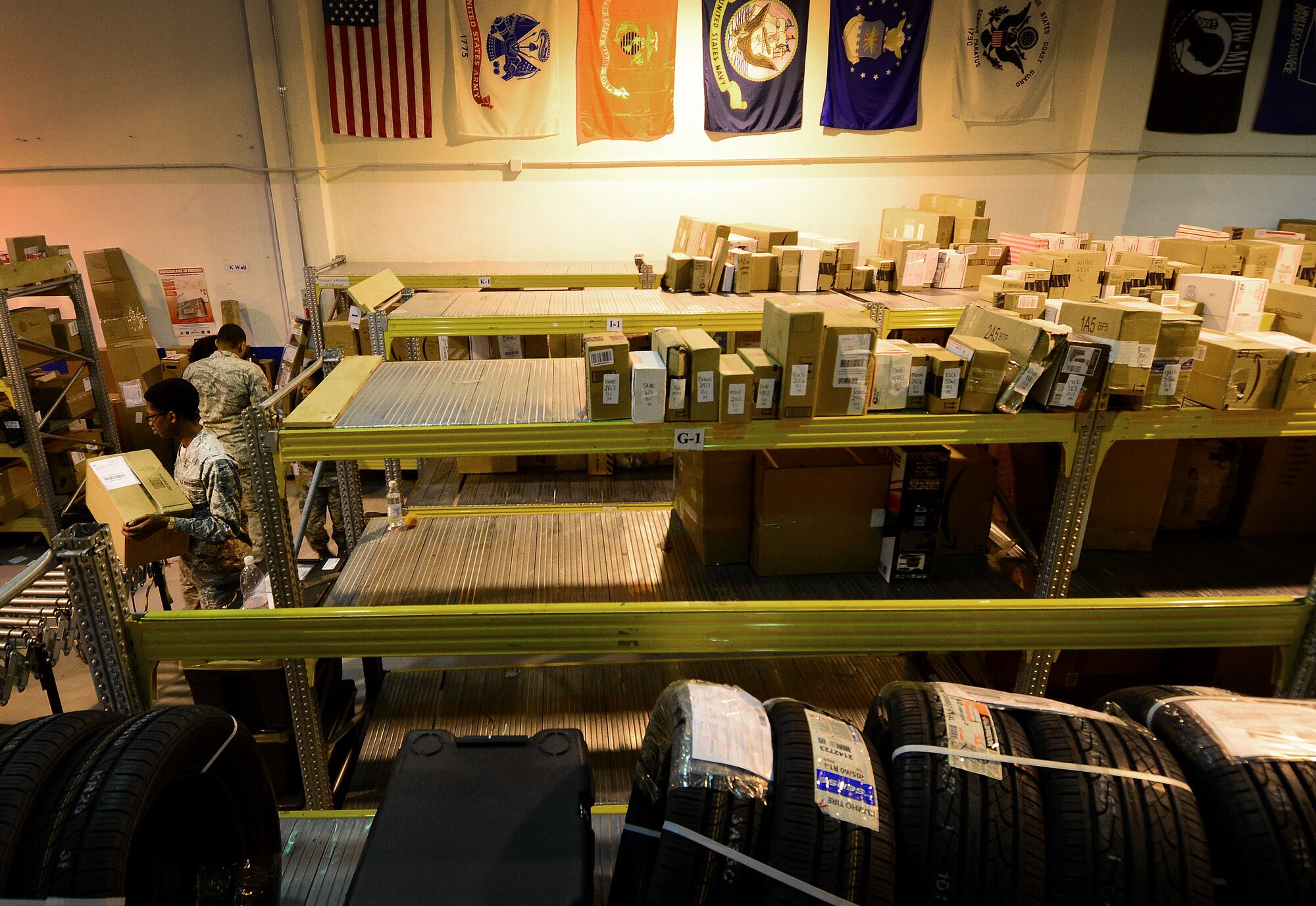 Airmen from the 31st Communication Squadron post office ensure mail is properly collected and distributed in a timely manner to more than 8,000 mail boxes. Before mail is unloaded, sorted, tagged and shelved, it travels through locations such as New York, England and Germany. (U.S. Air Force photo by Senior Airman Matthew Lotz/Released)