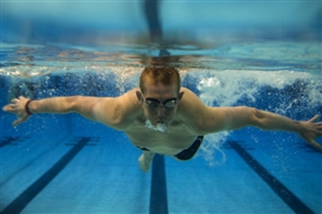 Zachary Burnash swims the 100 meter freestyle race at the Buchanan Natatorium in Las Vegas, Nev., March 1, 2015. More than 105 wounded, ill or injured service men and women from around the country will compete for a spot on the 2015 U.S. Air Force Wounded Warrior team. Burnash is an Air Force Wounded Warrior swimming competitor. 