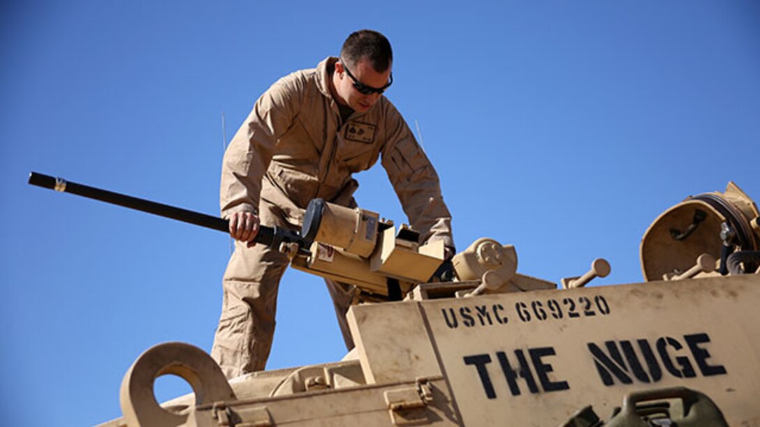 Sergeant Cody Olson, a main battle tank repairer/technician with Combat Logistics Battalion 24, 24th Marine Expeditionary Unit, assembles an M2 .50-caliber heavy machine gun on an M88A2 Hercules Armored Recovery Vehicle during an exercise ashore in the U.S. 5th Fleet area of operations, Feb. 8, 2015. The 24th MEU is conducting theater security cooperation exercises to increase cooperation and interoperability, enhance relationships with existing partners and promote long-term regional stability within the U.S. 5th Fleet area of operations. The 24th MEU is embarked on the ships of the Iwo Jima Amphibious Ready Group and deployed to maintain regional security in the U.S. 5th Fleet area of operations.