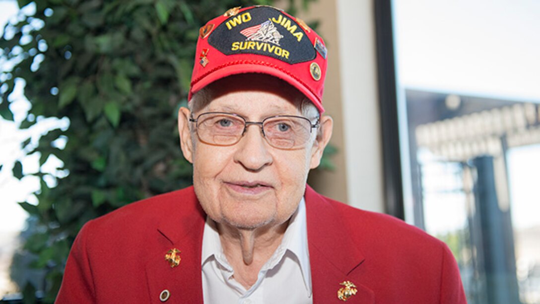 William "Bill" Schott, a Marine veteran and survivor from the battle of Iwo Jima, poses for a photo at the Iwo Jima Battle Survivors and Family Association 70th anniversary reunion in Wichita Falls, Texas, February 14, 2015. Schott served in the Marine Corps from 1943 to 1947.