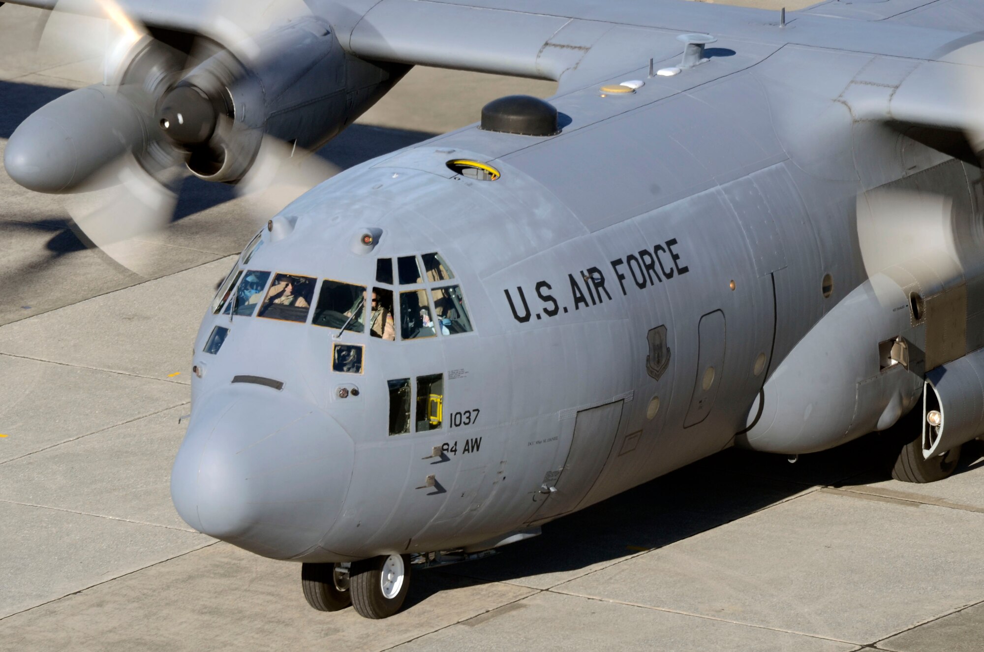 Members of the 94th Operations Group begin the flight to the Central Command Area of Responsibility in a C-130 Hercules from Dobbins Air Reserve Base, Ga. Jan. 8, 2015. Assigned inspection teams observed various aspects of the deployment preparation while noting required process improvements. (U.S. Air Force photo/Don Peek)