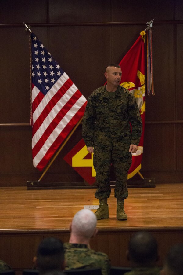 Sergeant Maj. Daniel Fliegel, 4th Marine Divison sergeant major, adresses Marines for the first time as the 4th MarDiv sergeant major, during a relief and appointment ceremony at Marine Corps Support Facility New Orleans, Feb. 26, 2015. During the ceremony, Marines welcomed Fliegel and bid farewell to Sgt. Maj. Bradley Kasal as he assumes his post as the new I Marine Expeditionary Force sergeant major. 