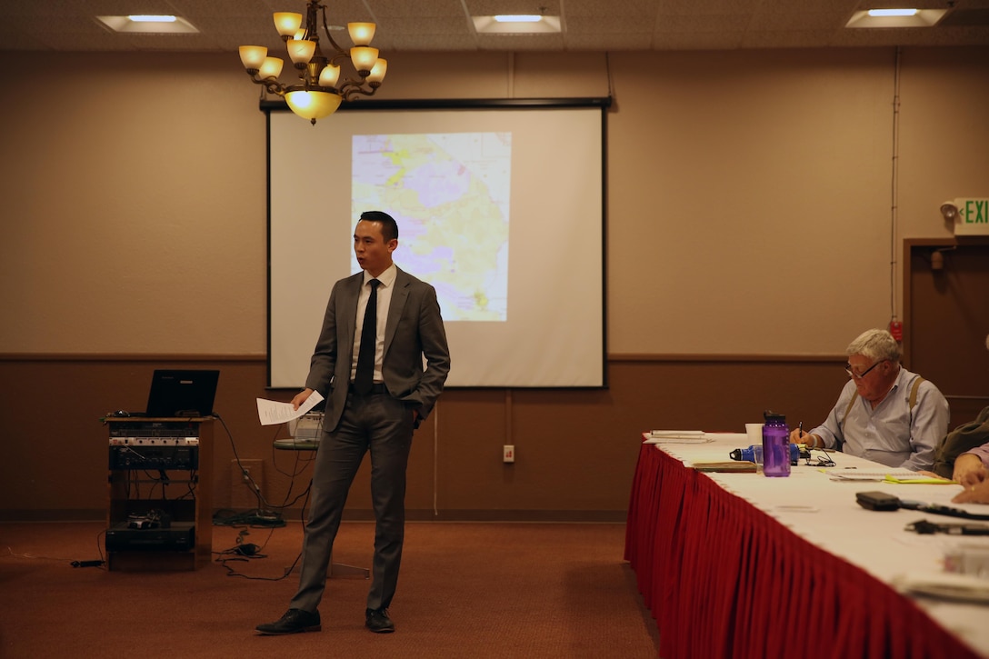 Kevin Chang, representative of Senator Feinstein’s office, explains the key parts in the Land Acquisition bill currently in legislation at the Officers’ Club, Feb. 18, 2015. Chang explained where the training areas are going to be and how the bill will work in conjunction with several agencies to preserve the surrounding wildlife and historical significance of the new training areas. (Official Marine Corps photo by Lance Cpl. Thomas Mudd/ Released)