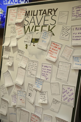 The information fair at Crossroads Mall aboard Marine Corps Air Station Iwakuni, Japan, provides a board for station residents to post their savings goals, Feb. 27, 2015. Since the launch of Military Saves Week in 2007, more than 180,000 individuals took the saver pledge or re-pledged.