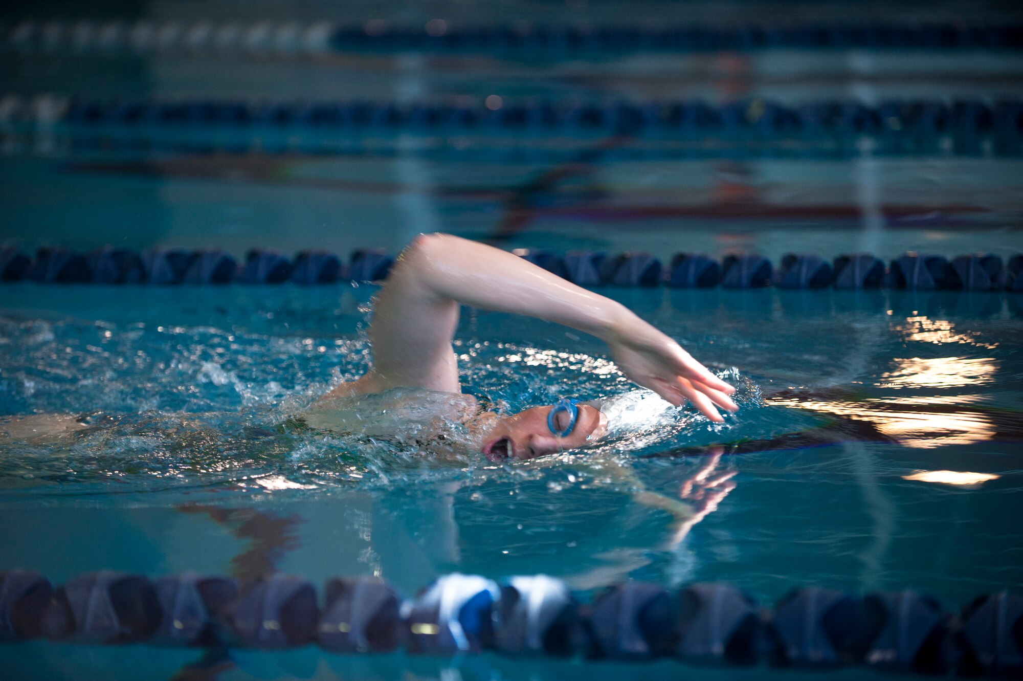 Linn Knight, 2015 U.S. Air Force Trials participant, practices the freestyle stroke during a practice swimming session at Nellis Air Force Base, Nev., Feb. 27, 2015. In addition to encouraging wounded warriors to compete in adaptive sports, the trials provide wounded warrior families with a variety of support services, making their jobs as care givers more manageable and helping to alleviate the stress that comes with a major life change. (U.S. Air Force photo by Senior Airman Thomas Spangler)