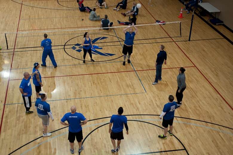 Participants in the 2015 U.S. Air Force Trials volleyball team practice at Nellis Air Force Base, Nev., March 2, 2015. Overall, the Air Force Trials consist of 13 various adapted sporting events. (U.S Air Force photo by Senior Airman Timothy Young) 
