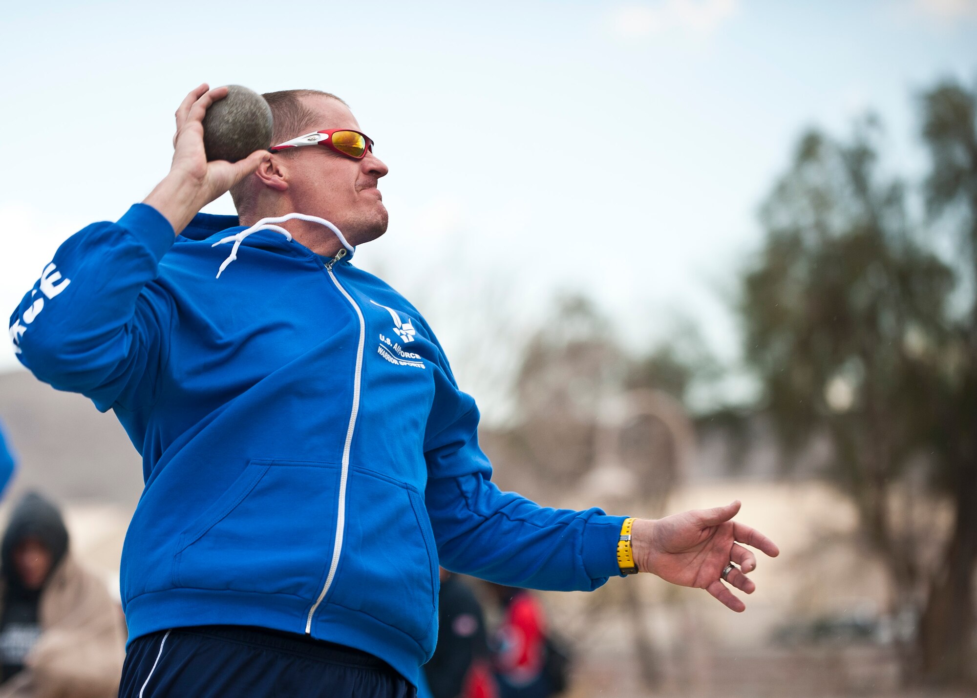 A participant in the 2015 U.S. Air Force Trials prepares to throw a shot-put during the field competition at Nellis Air Force Base, Nev., March 3, 2015. During the trials, participants will be competing for a spot on the 2015 U.S. Air Force Wounded Warrior Team, which will represent the Air Force at adaptive sports events throughout the year.  (U.S. Air Force photo by Staff Sgt. Siuta B. Ika)