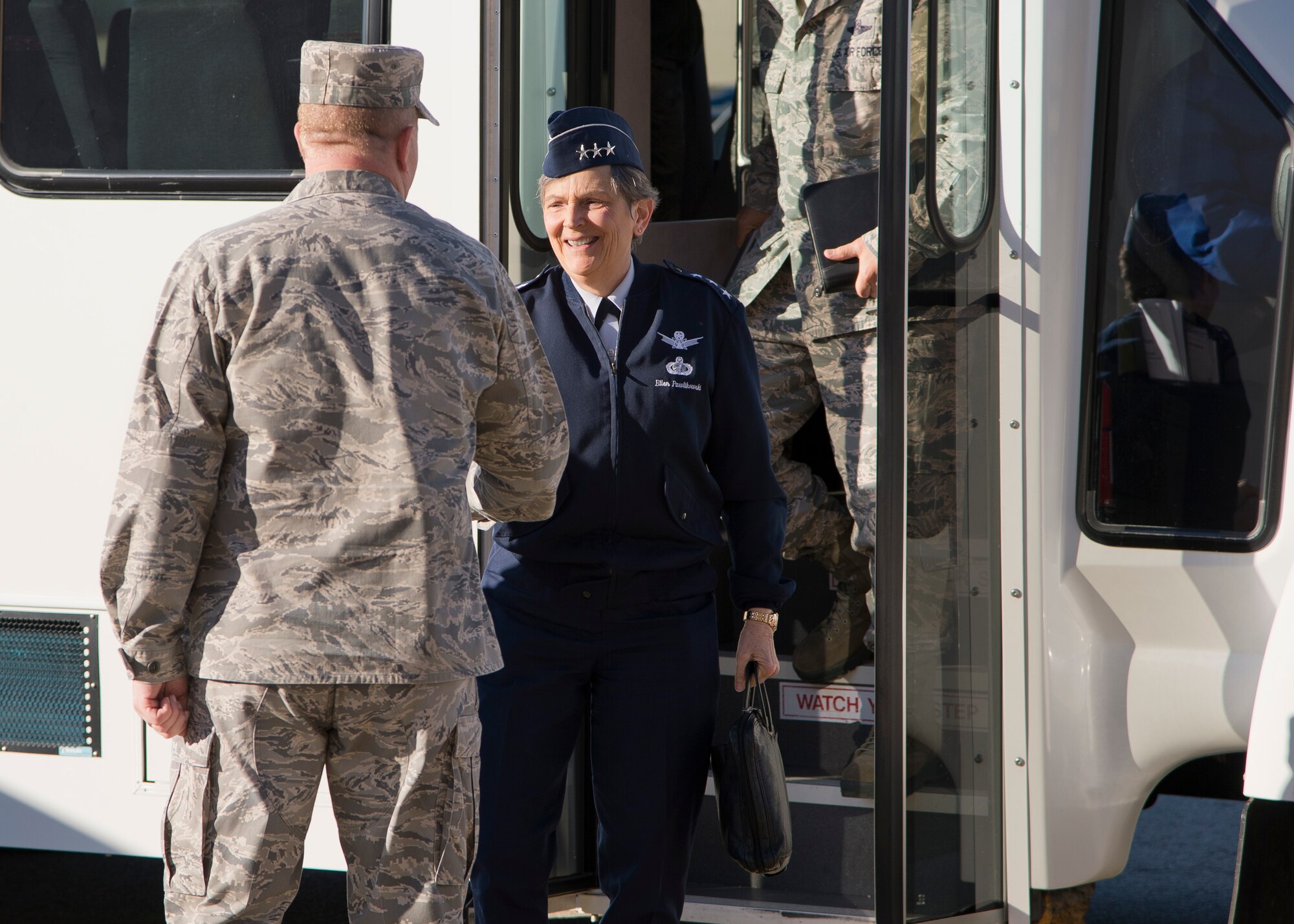 Lt. Gen. Ellen M. Pawlikowski, Military Deputy, Office of the Assistant Secretary of the Air Force for Acquisition, is greeted by Col. Robert Lepper, 412th Maintenance Group commander, during a visit to his facilities March 3. Pawlikowski visited Edwards for mission briefs and a tour of base facilities. (U.S. Air Force photo by Ethan Wagner)