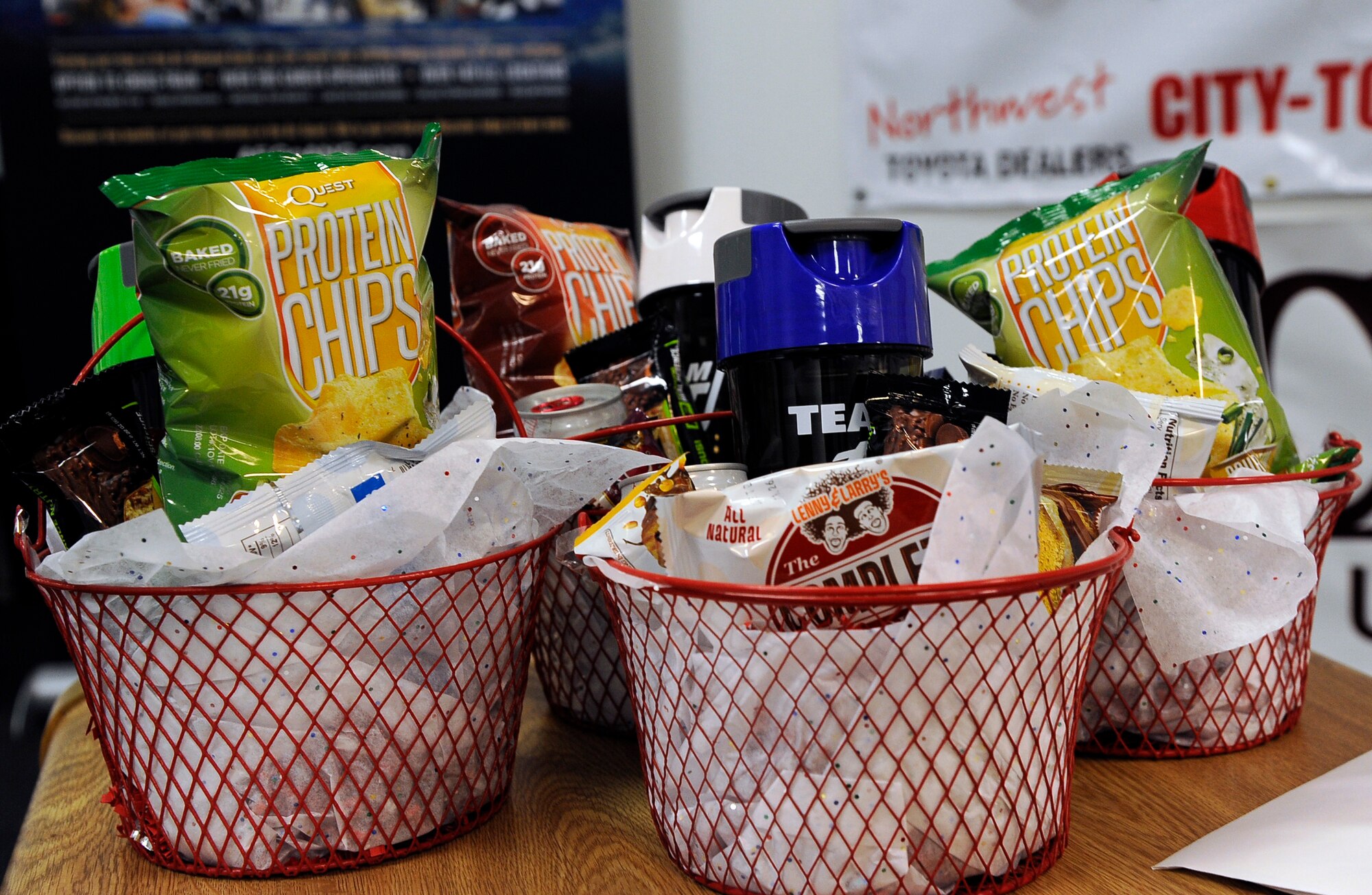 The Malmstrom Air Force Base Fitness Center held a Largest Loser Competition from Jan. 9 to Feb. 27. The winning four-person team received baskets full of healthy goodies Mar. 2. (U.S. Air Force photo/Staff Sgt. Delia Marchick)
