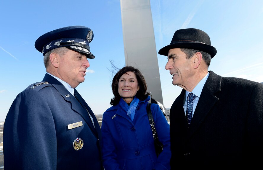 Air Force Chief of Staff Gen. Mark A. Welsh III and his wife, Betty, speak with retired Col. Leon F. "Lee" Ellis, a former Air Force prisoner of war, following a wreath laying ceremony March 2, 2015, at the Air Force Memorial in Arlington, Va. The ceremony honored Air Force Vietnam POWs and missing in action. (U.S. Air Force photo/Scott M. Ash)