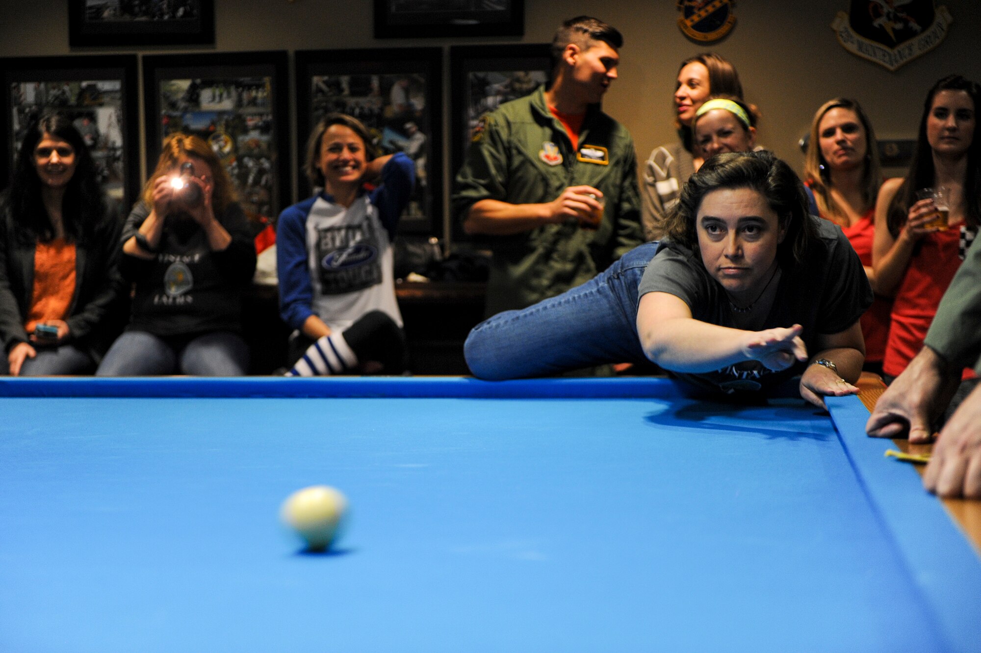 Tammy Trychon, wife of U.S. Air Force Col. Eric Trychon, 93rd Air Ground Operations Wing vice commander, shoots the ball toward her opponent, during the Moody Air Force Base Annual Spouses Crud Tournament Feb. 27, 2015, at Moody AFB, Ga. Trychon’s team, The Vintage Ladies won their first game against the 41st Rescue Squadron spouses but were ultimately defeated by the 75th FS spouses. (U.S. Air Force photo by Andrea Jenkins/Released)



