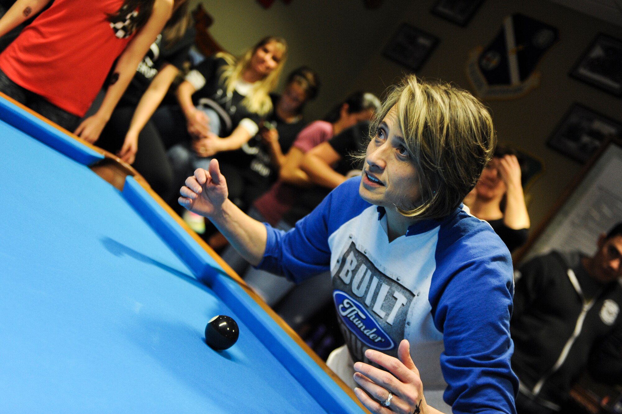 Alissa Boland, wife of U.S. Air Force Lt. Col. Patrick Boland, 23d Fighter Group, stares down her opponent during a serve at the Moody Air Force Base Annual Wives Crud Tournament Feb. 27, 2015, at Moody AFB, Ga.  The 74th Fighter Squadron’s team made it to the championship game only to be defeated by the rival 75th FS spouses. (U.S. Air Force photo by Andrea Jenkins/Released) 

